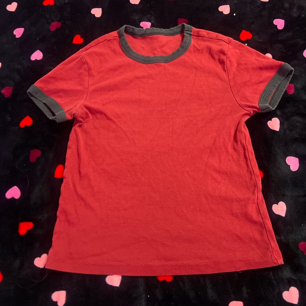 red t-shirt with black sleeves
